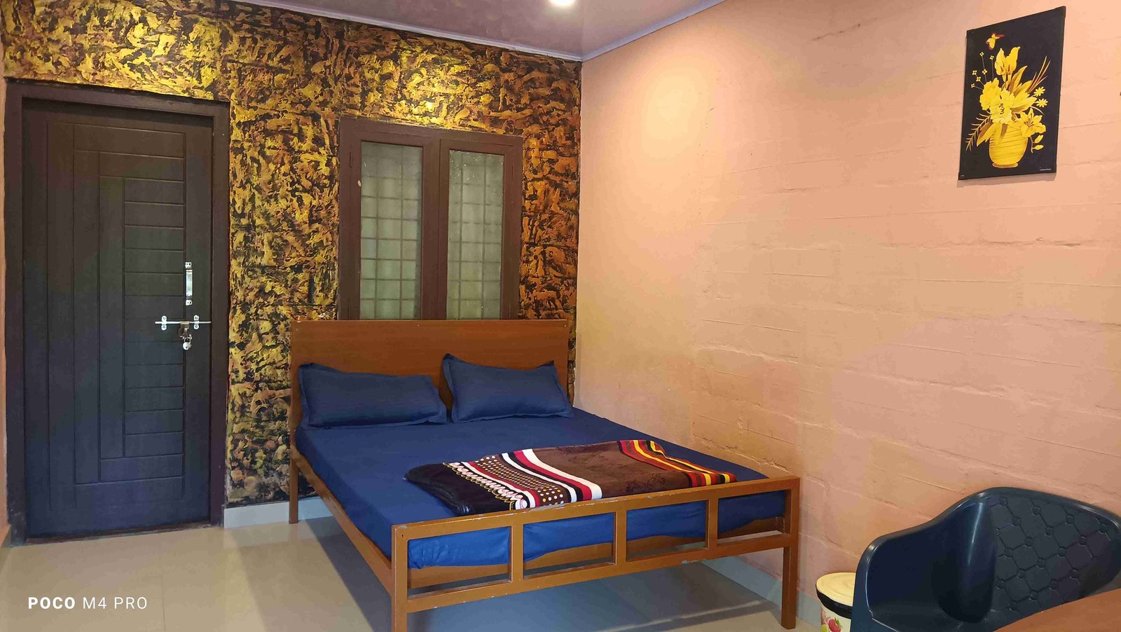 AC room with accent wall at Clay Club Farm Stay